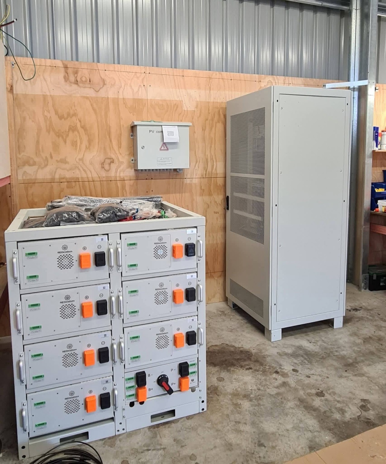 Battery modules and an equipment cabinet inside a workshop